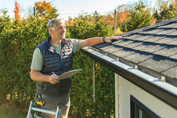 Professional Hail Damage Roof Repair technician working in Wray, CO
